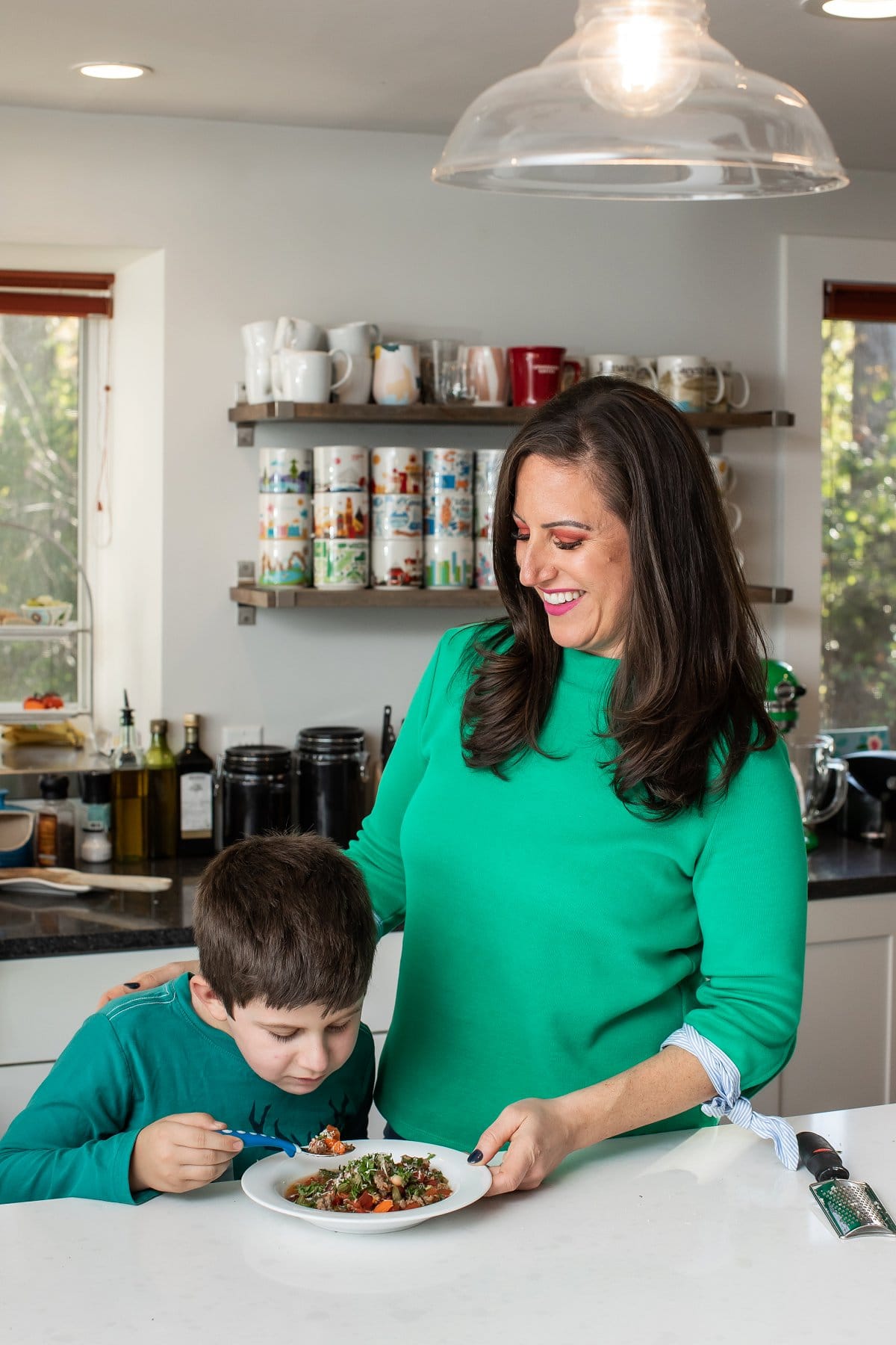 Mom and son eating soup 