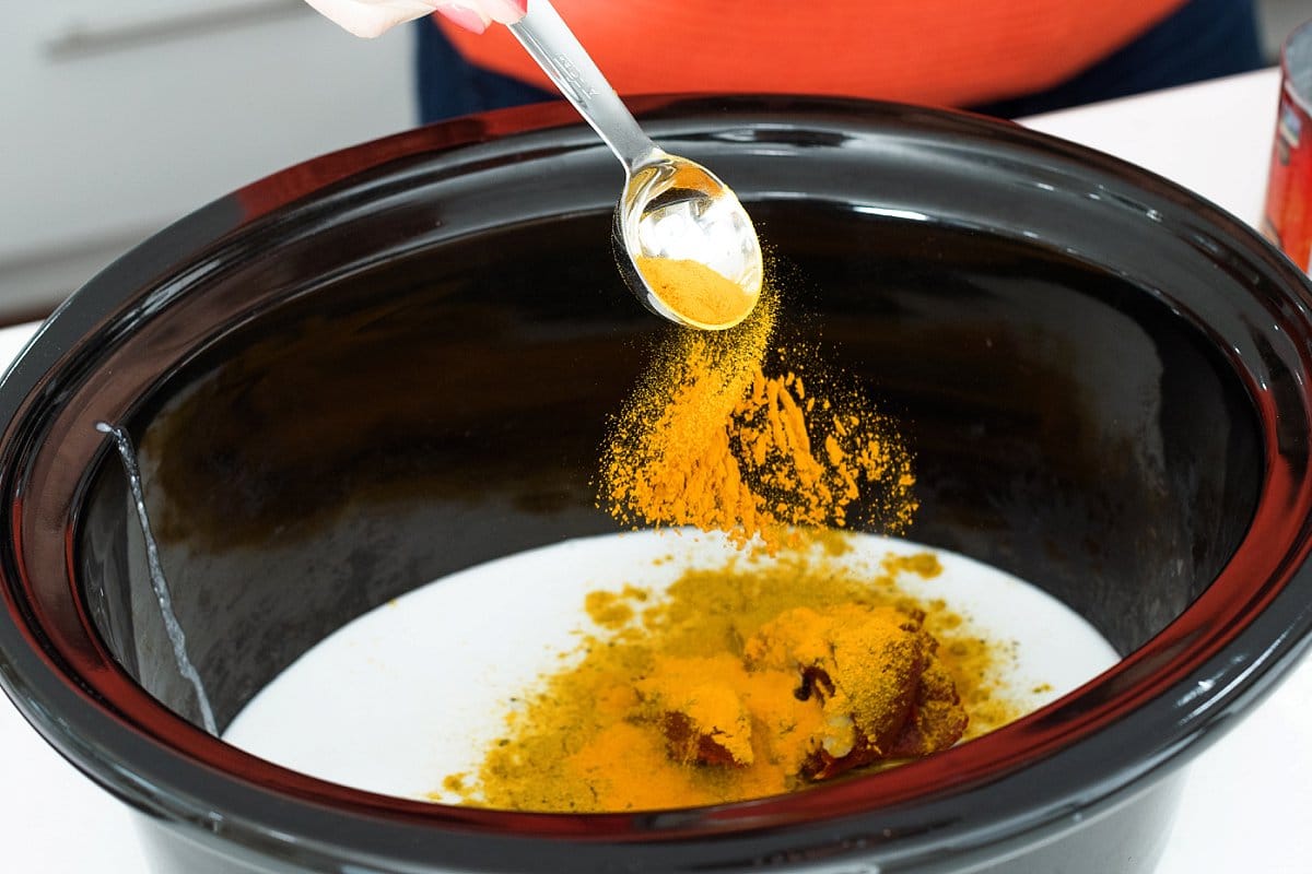 adding spices to slow cooker