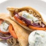 Slow Cooker Chicken Shawarma Pita Sandwiches with Cucumber Sauce