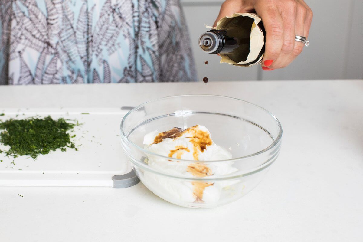 pouring worcestershire sauce