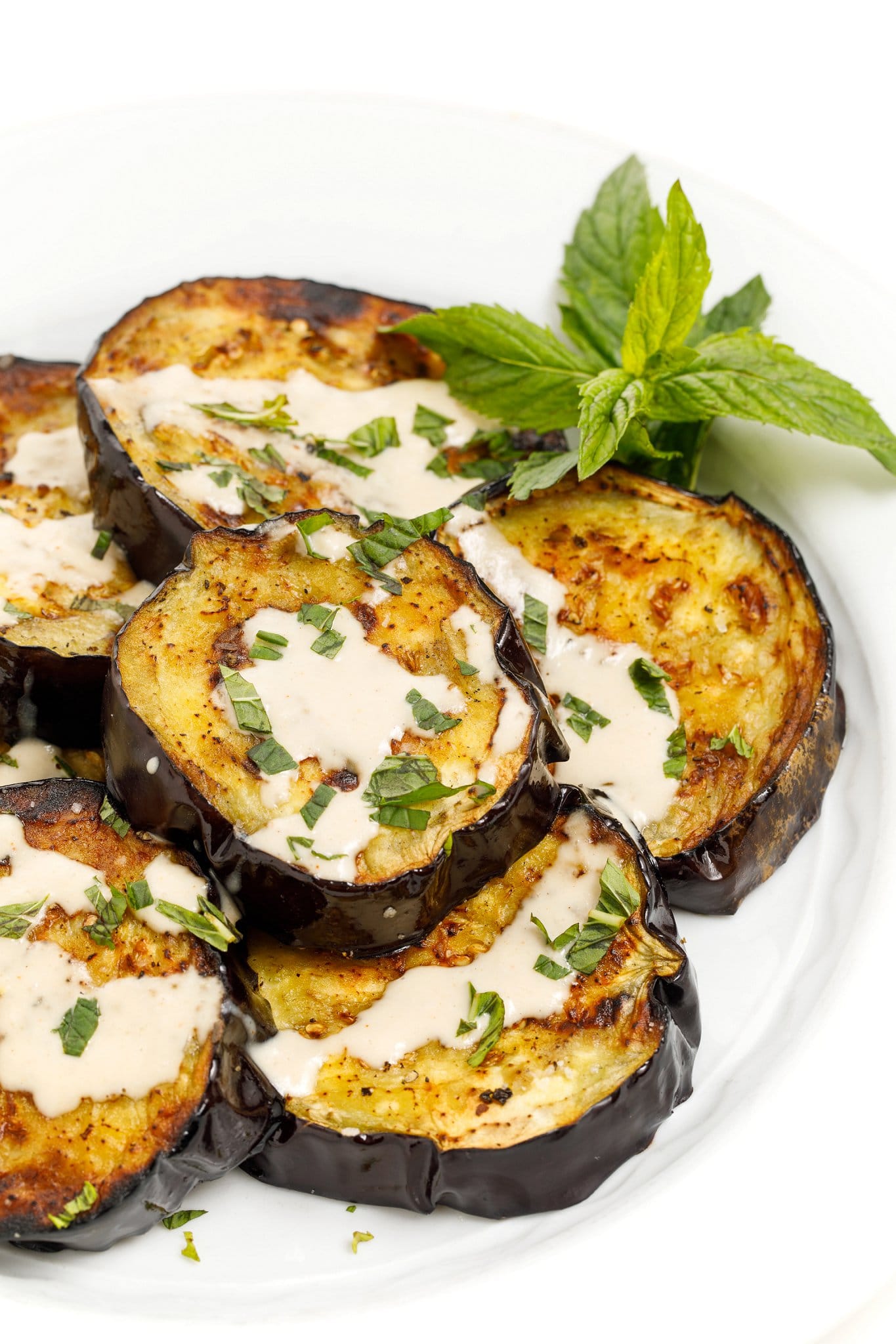 Grilled eggplant with tahini sauce.