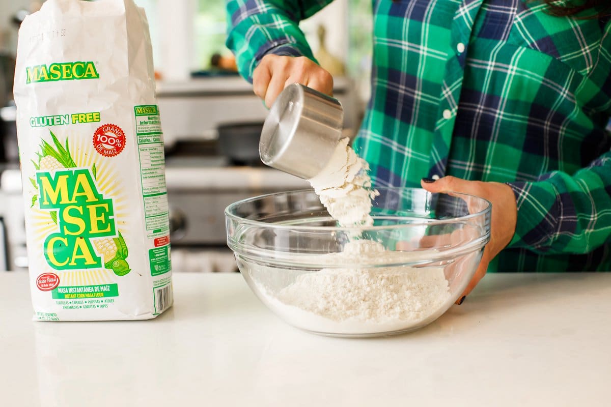 pouring flour for corn tortillas