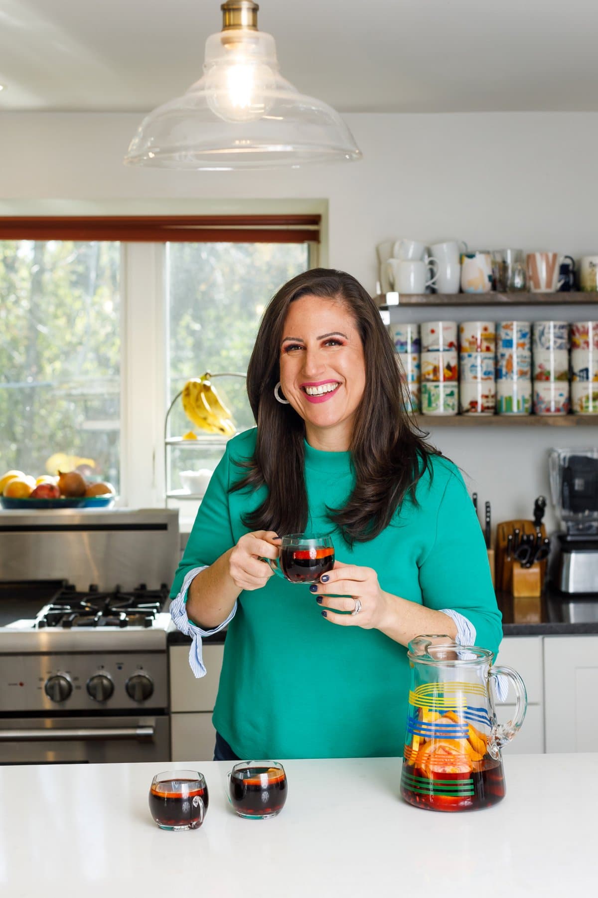 Liz drinking pomegranate sangria