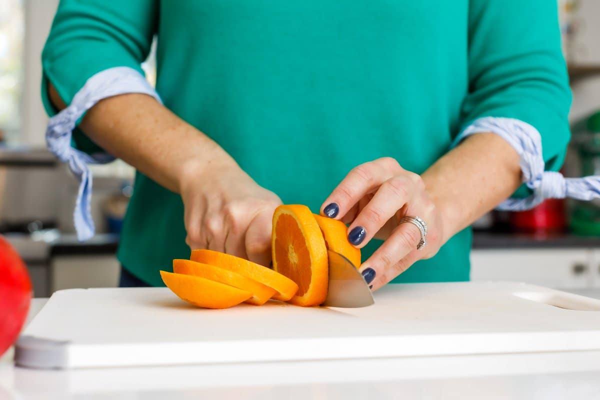 Liz slicing orange