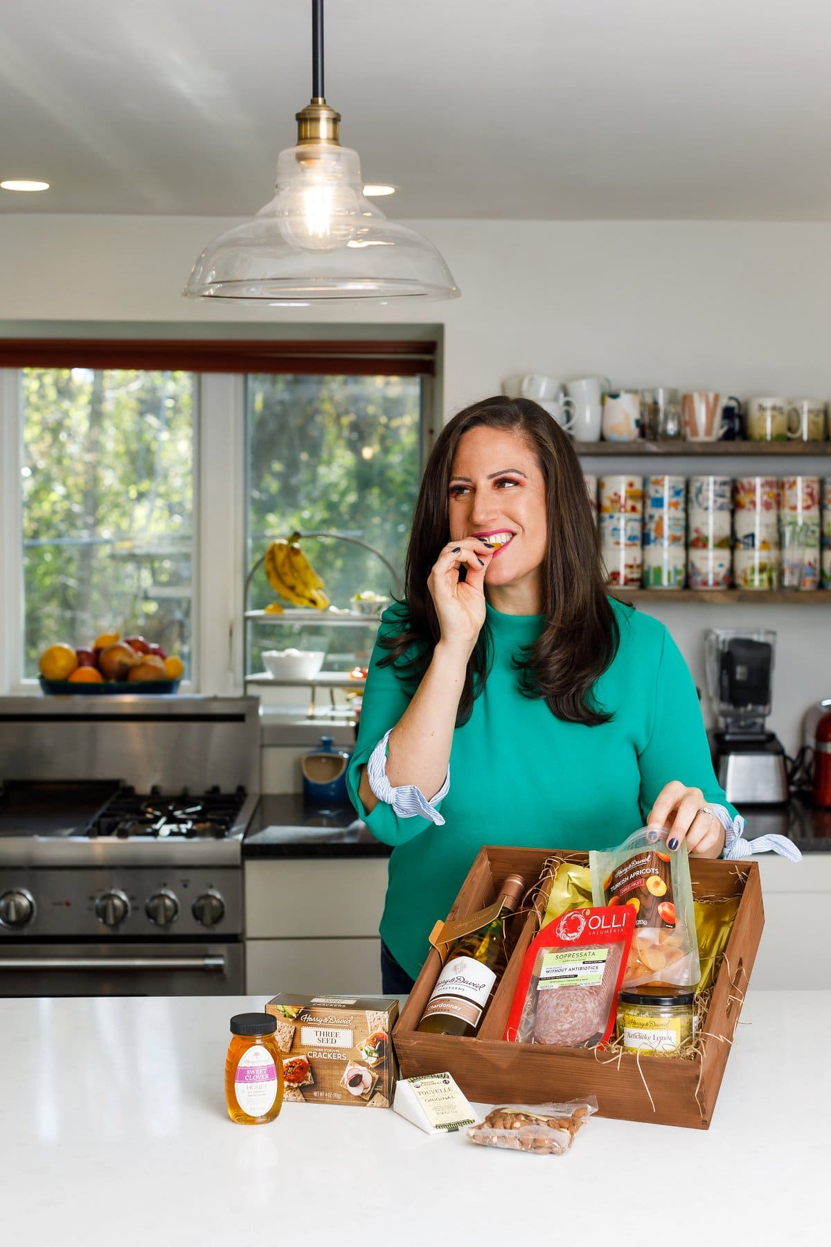 Liz eating Harry and David Gift Box items