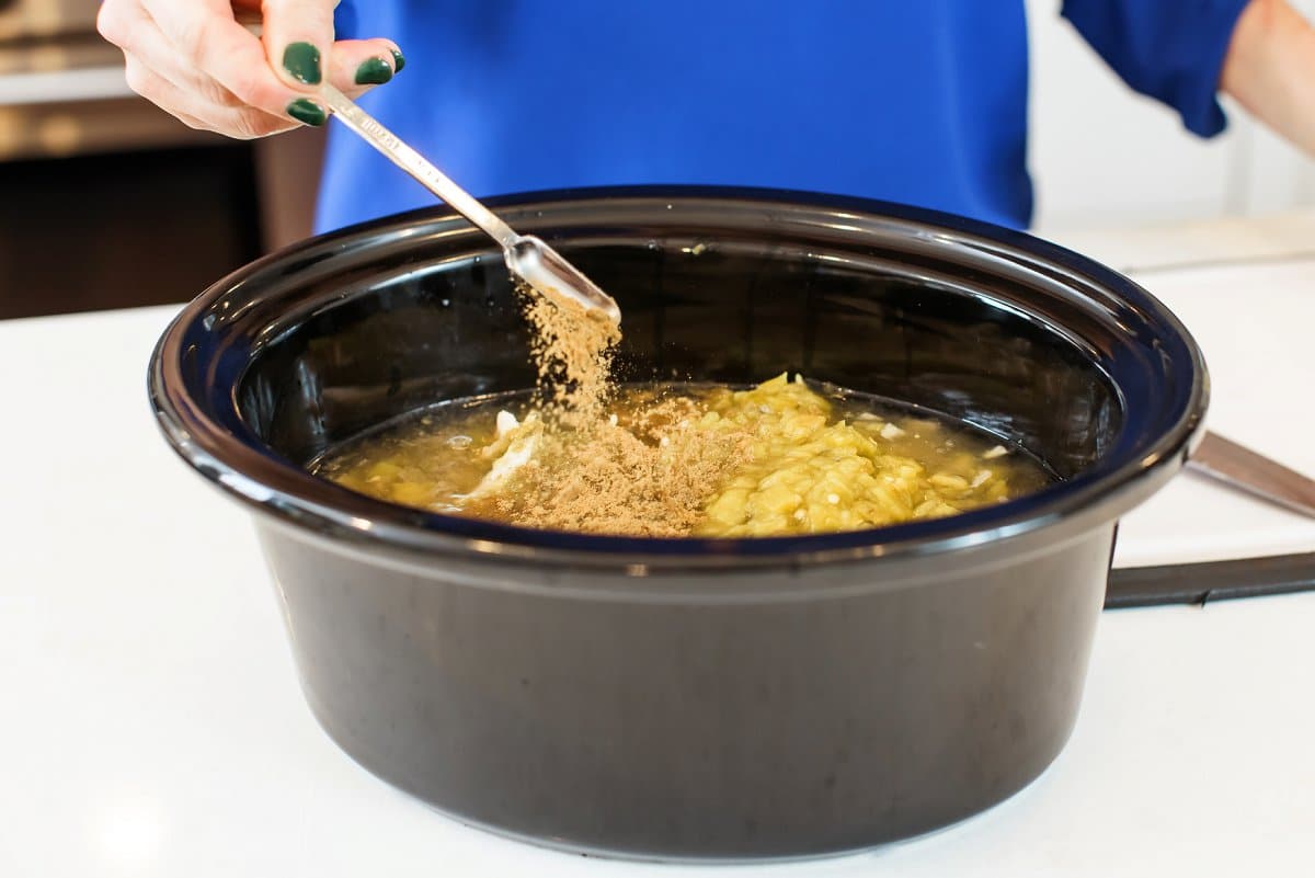 adding Seasoning for Slow Cooker White Bean Chicken Chili