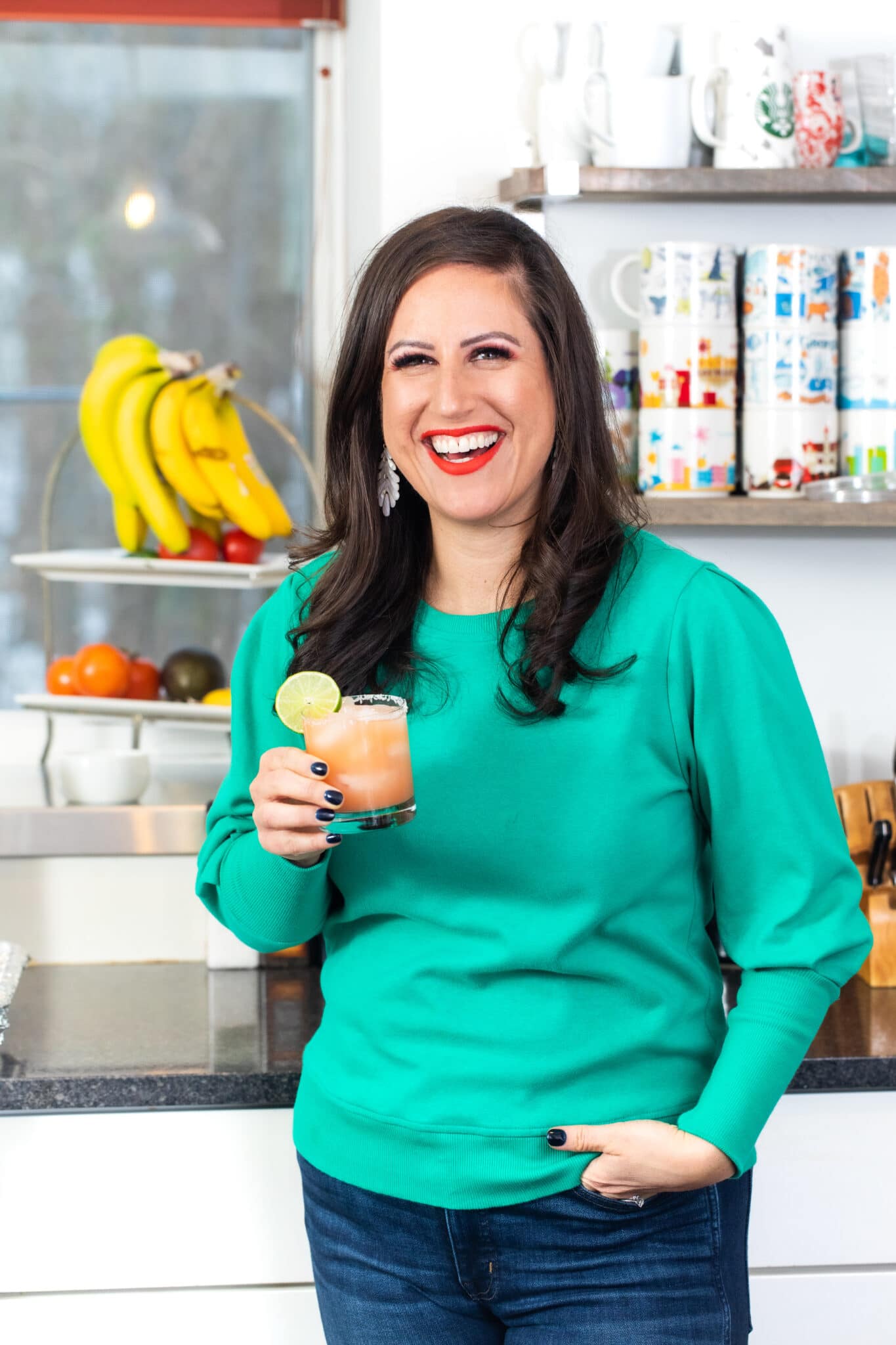 Liz holding summer cocktail