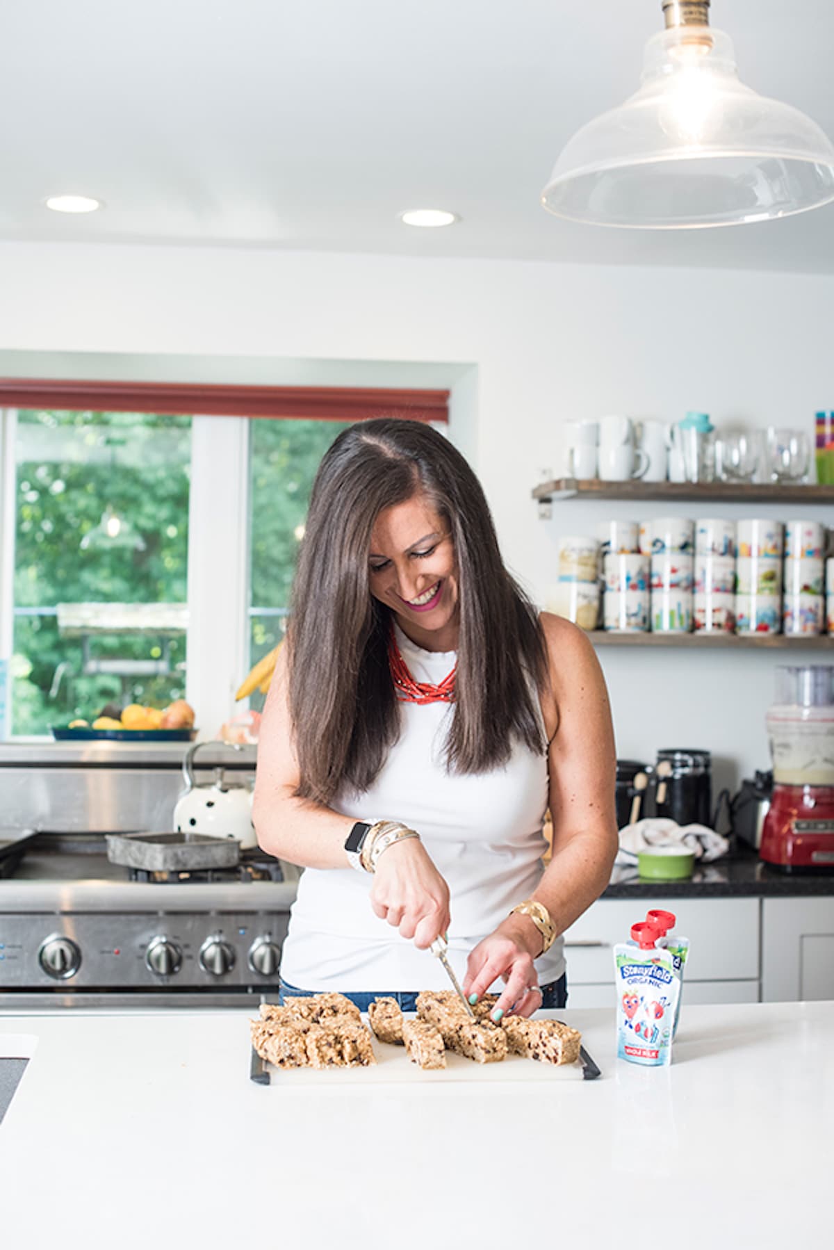Liz cutting granola bars