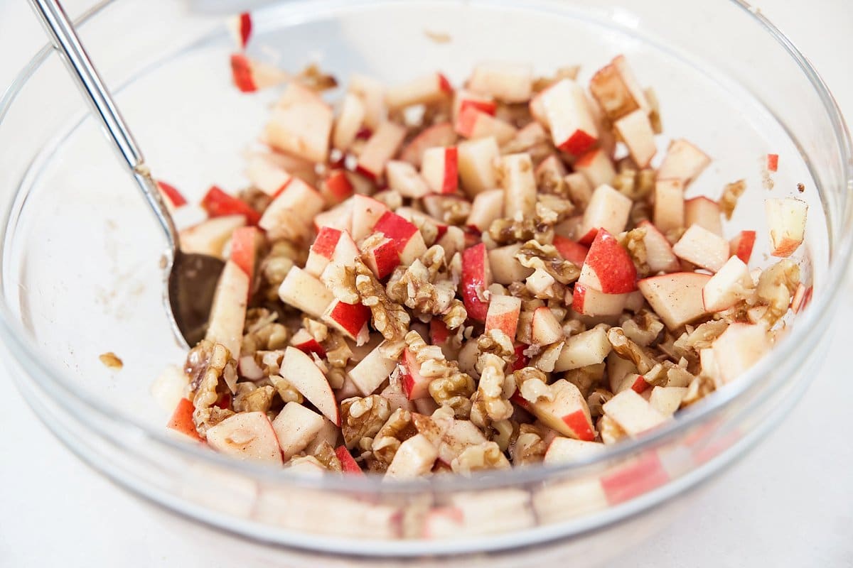 Stirring charoset in a bowl