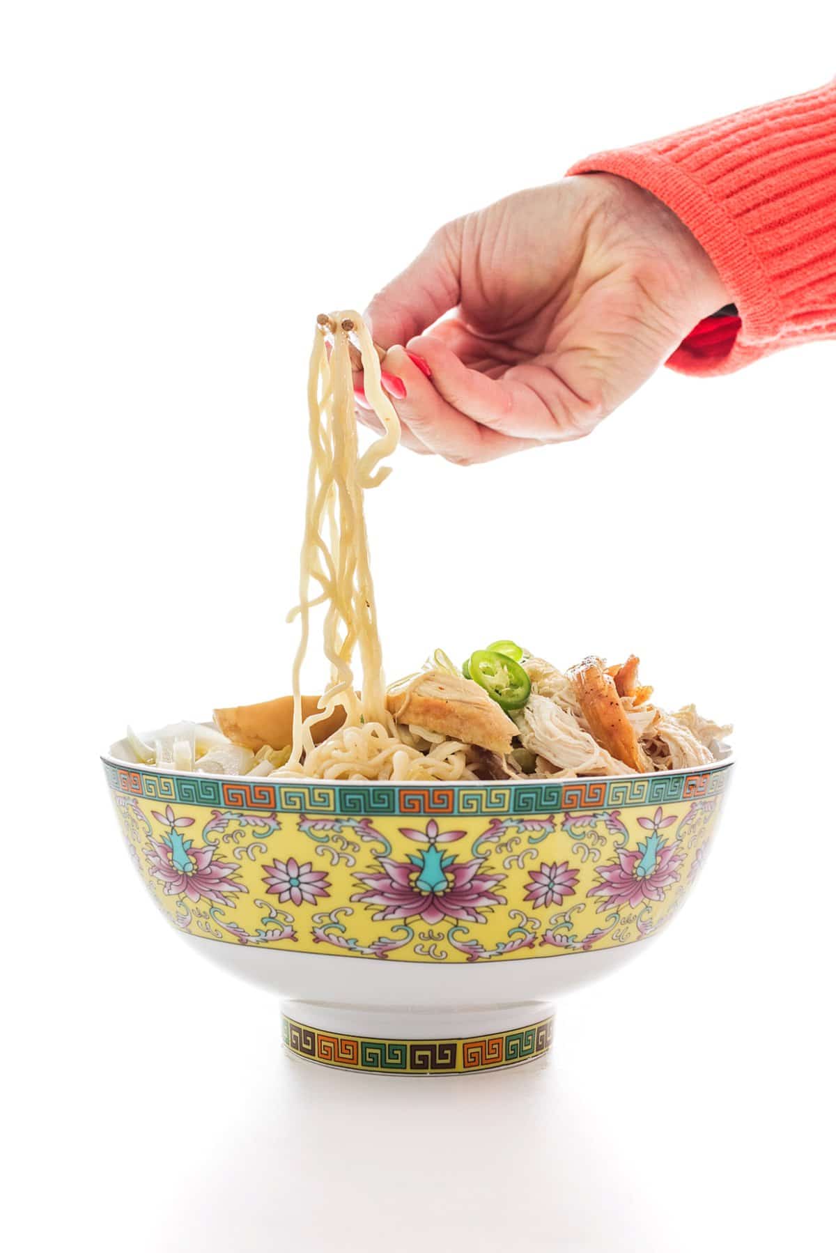 spicy chicken ramen with chopsticks