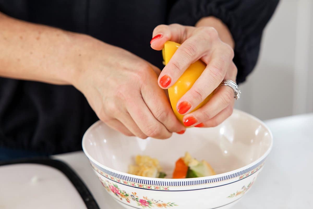 scooping out the insides of a yellow pepper