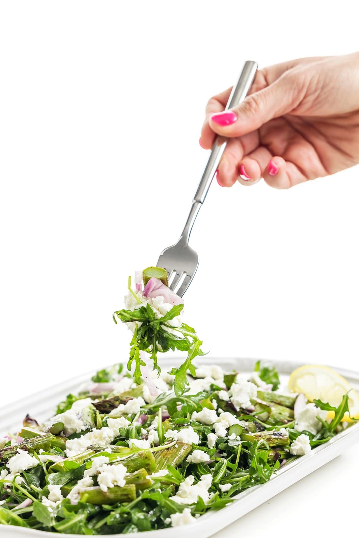 Easy Grilled Asparagus Salad with Arugula on a fork