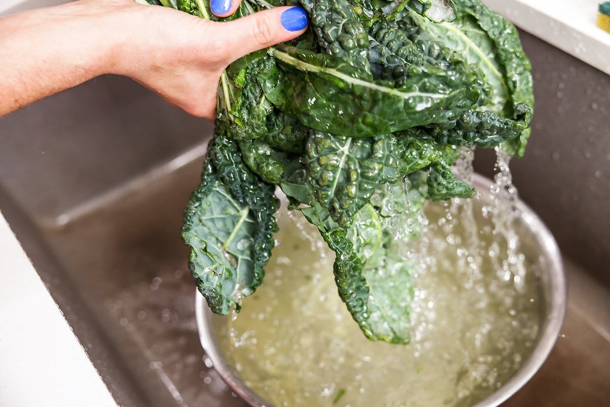 preparing kale by washing