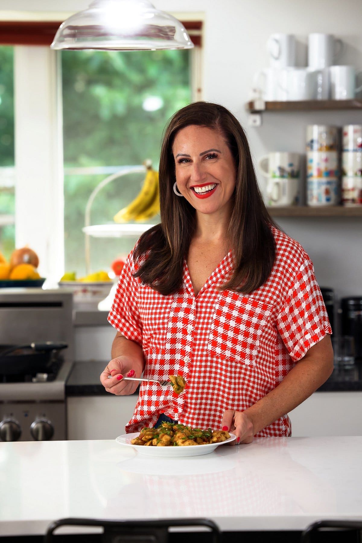 Liz enjoying spicy chicken sauté with jalapeño.