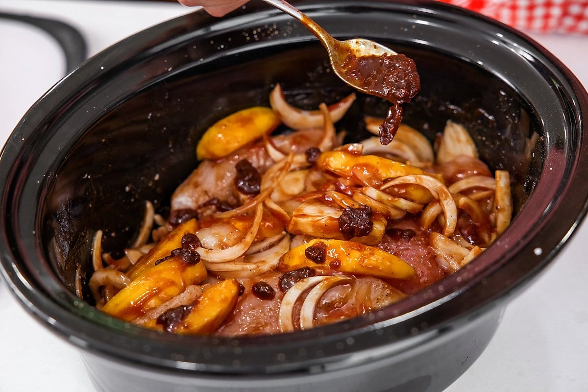 Stirring in adobo peppers