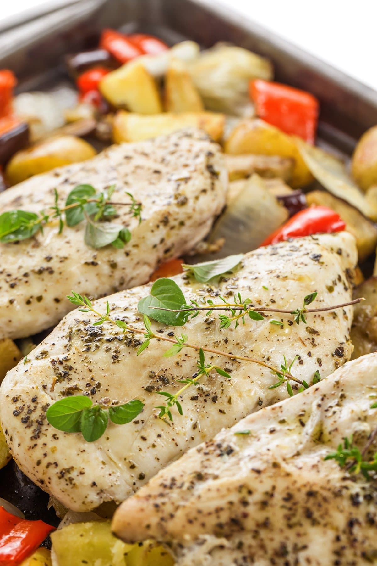 Finished sheet pan Greek chicken and vegetables.