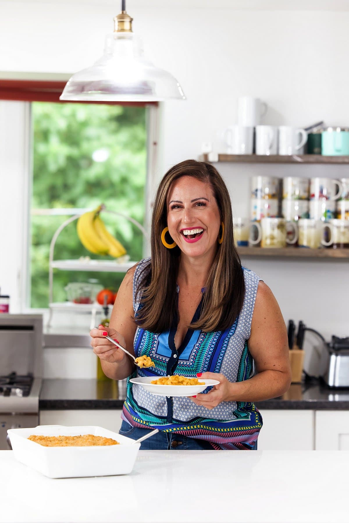 person enjoying backed mac and cheese with pumpkin