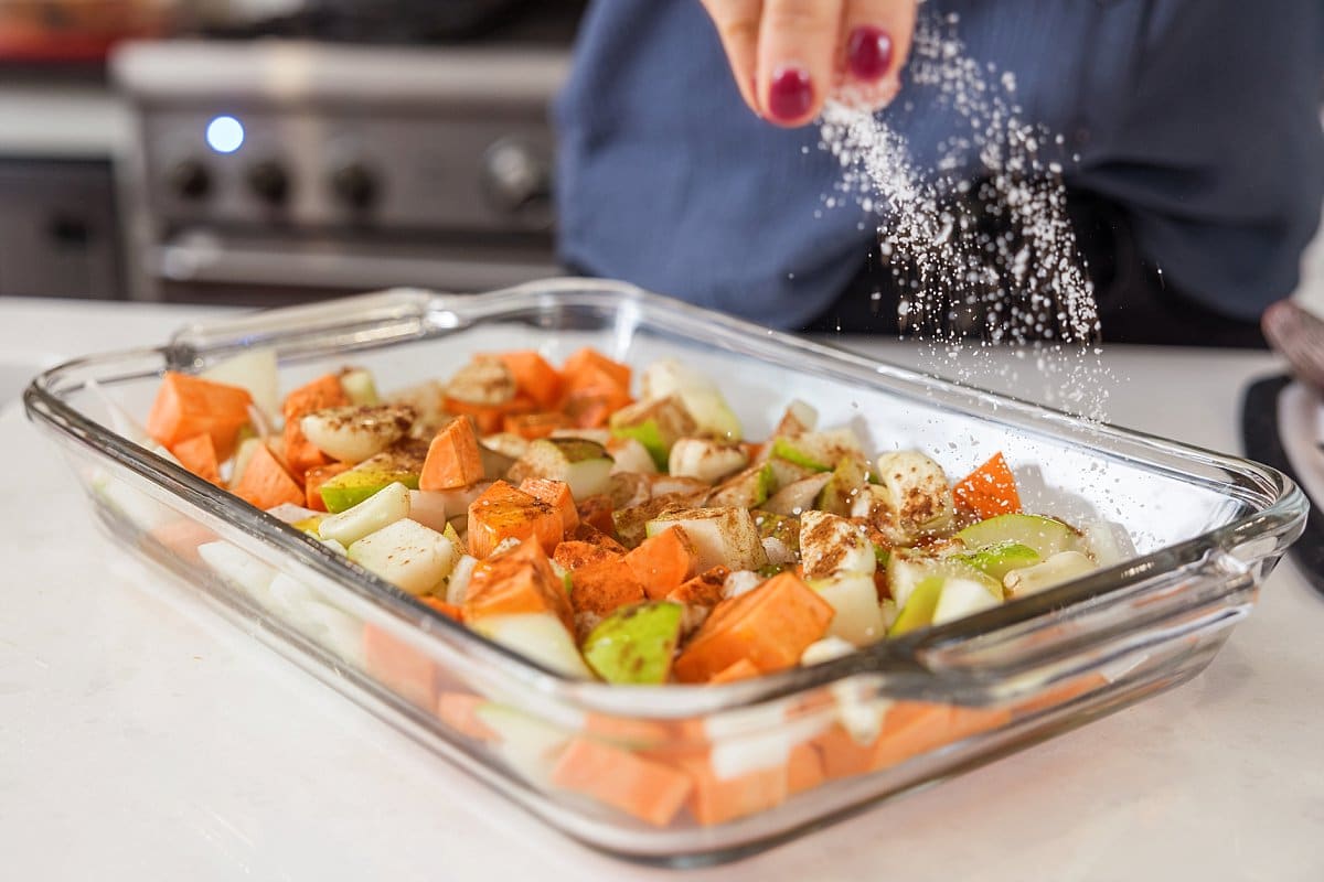 seasoning food with salt