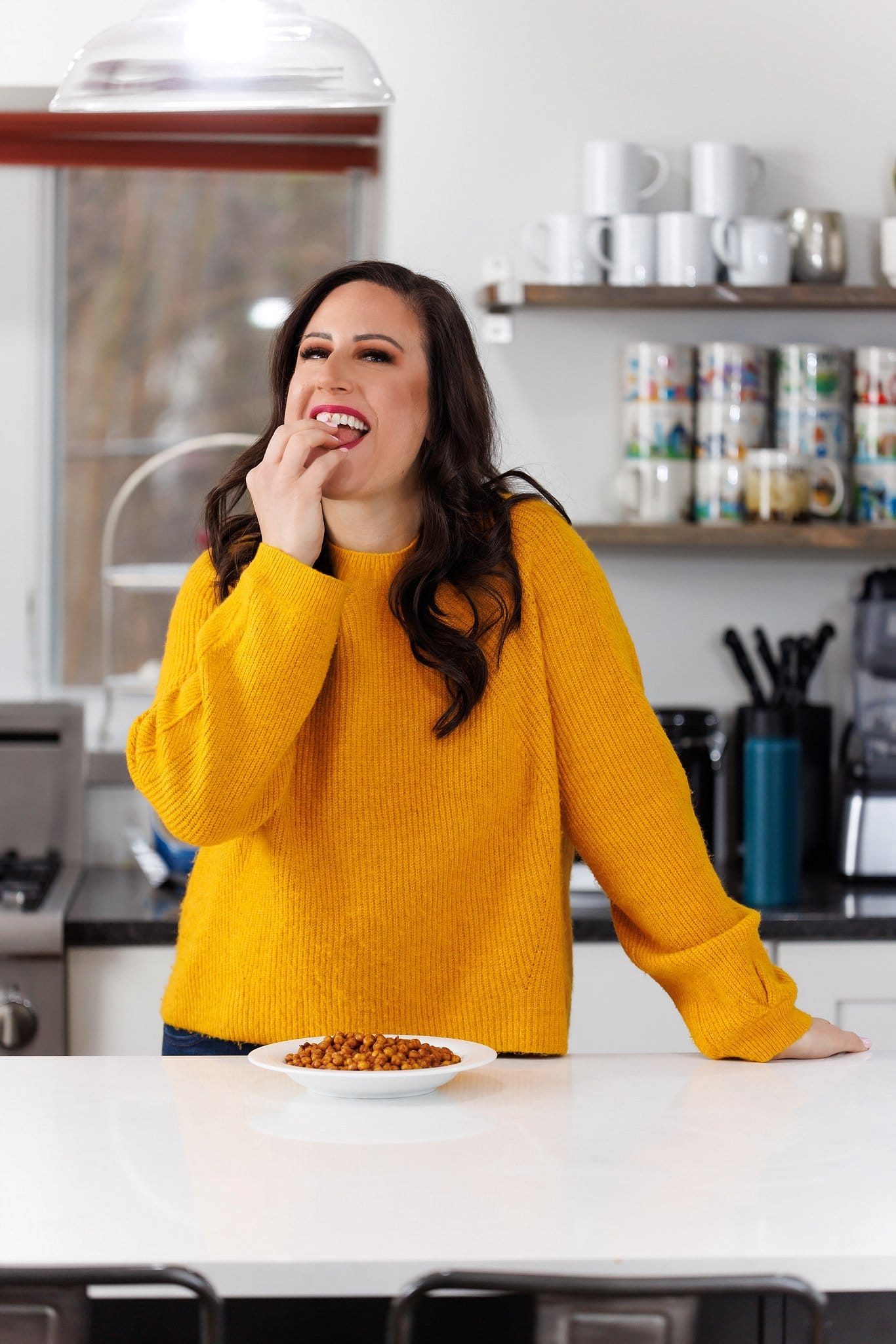 Liz eating oven roasted chickpeas.