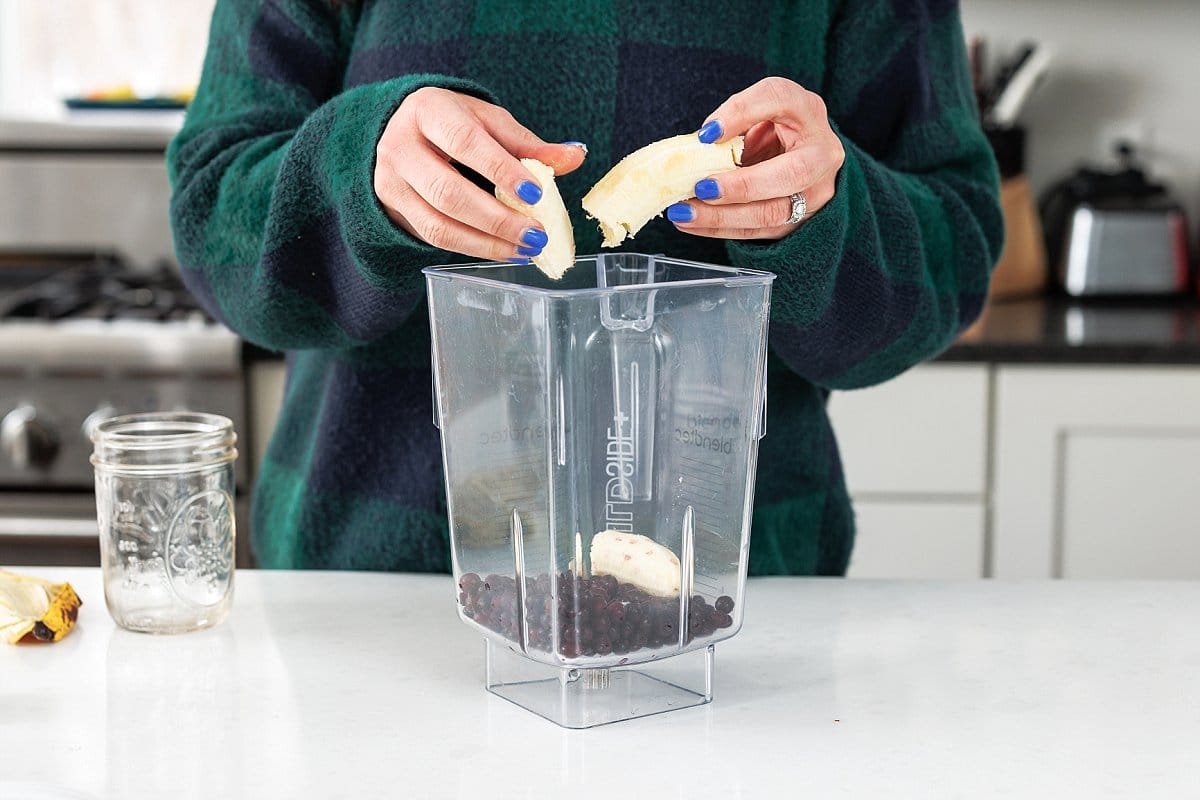 Adding banana to blender.