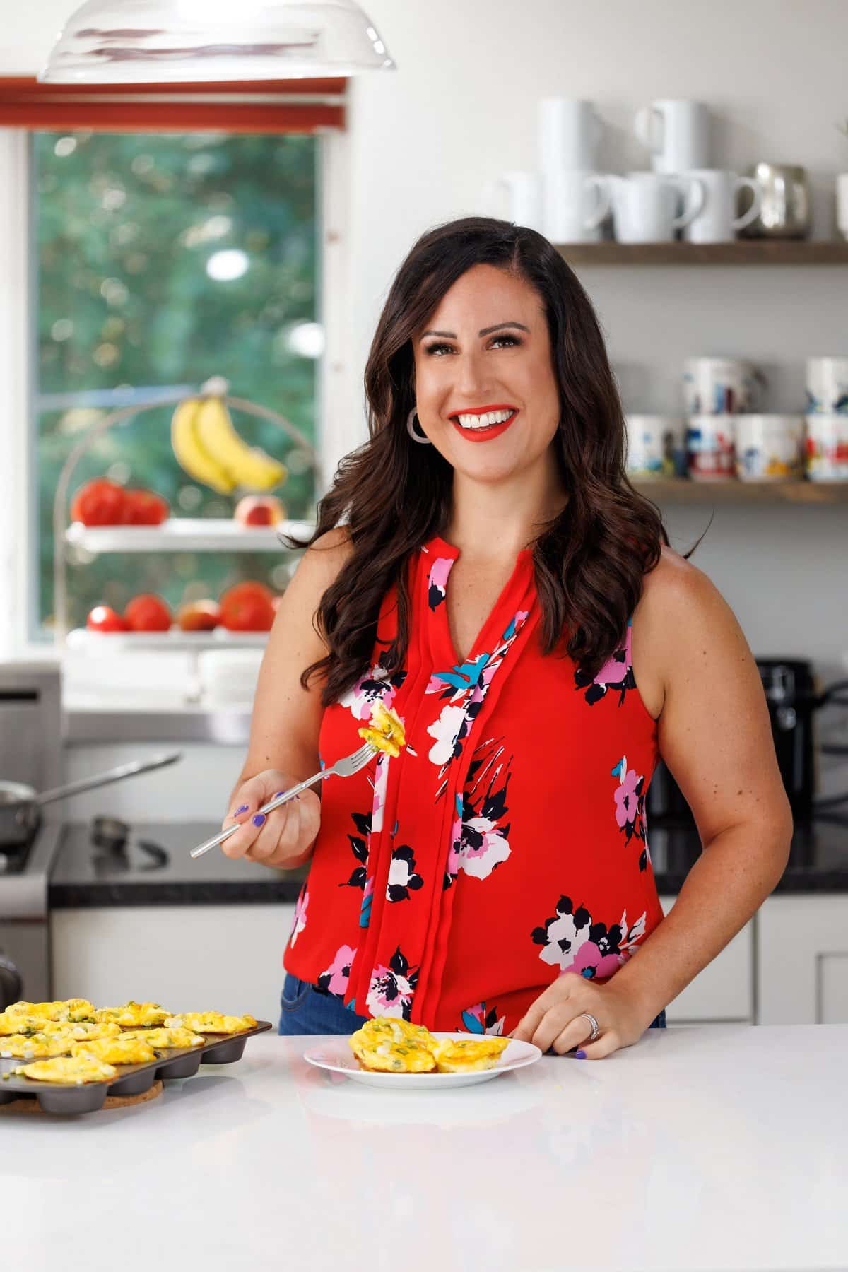 Liz enjoying ham and cheese baked egg cups.