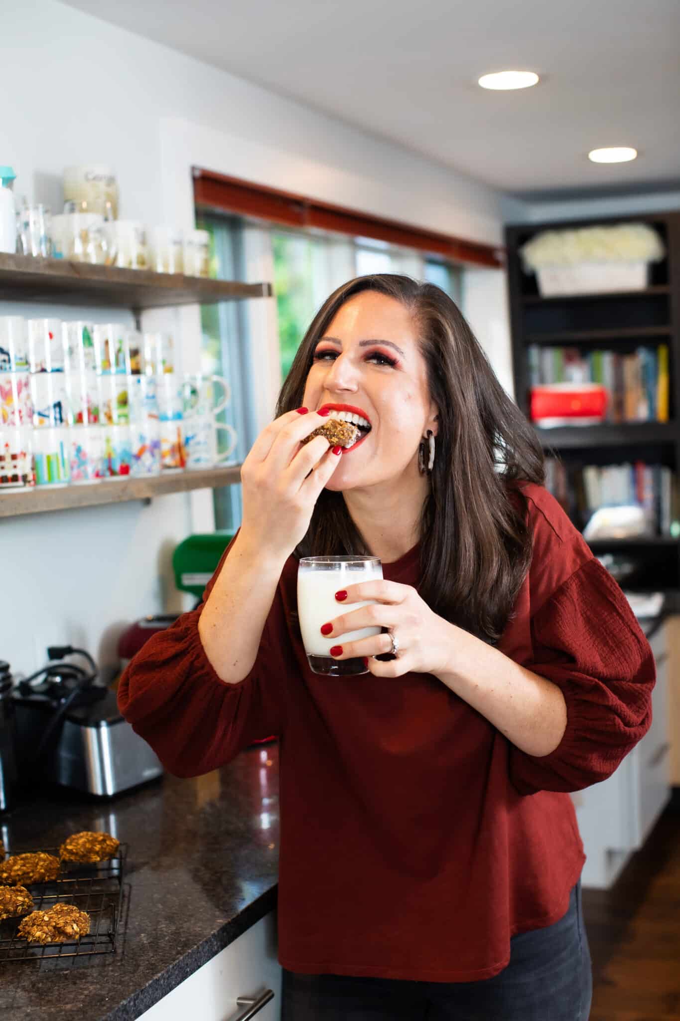 Liz enjoying pumpkin oatmeal breakfast cookies.
