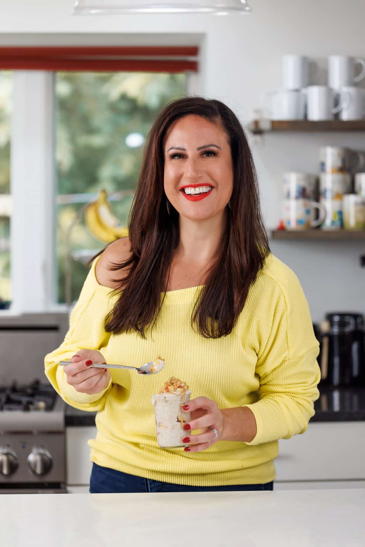 Liz enjoying apple peanut butter overnight oats.