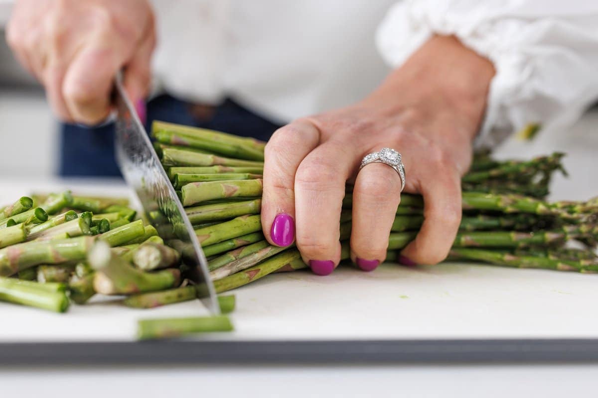 Liz trimming asparagus stalks.