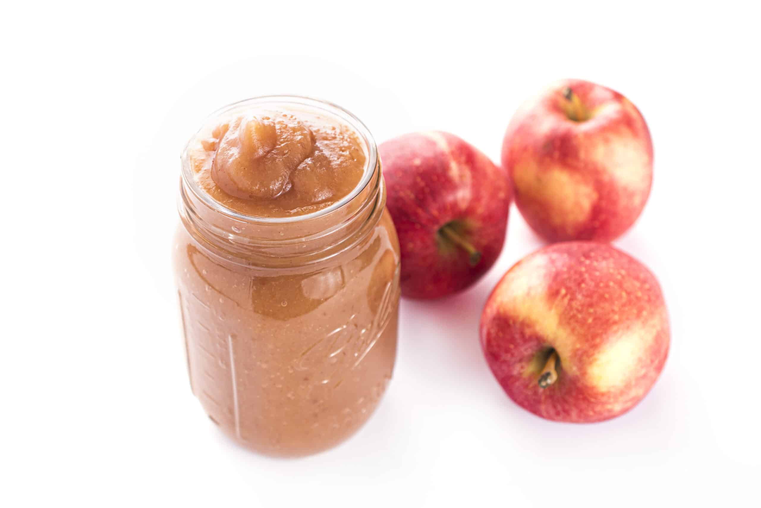 Slow cooker apple butter with whole apples.