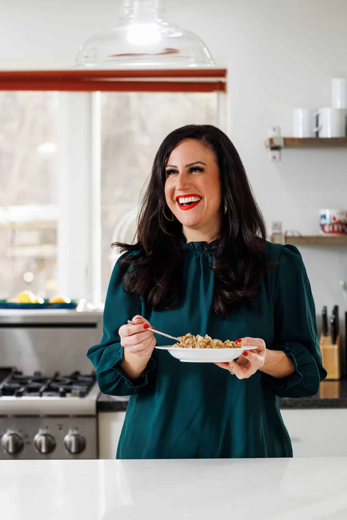 Liz eating quick banana oatmeal with flax.