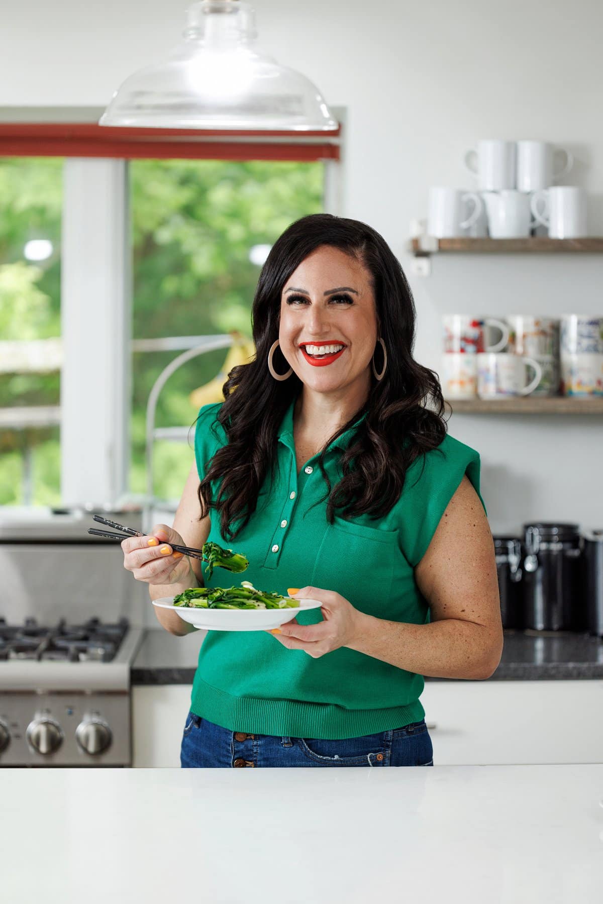 Liz eating garlicky bok choy.