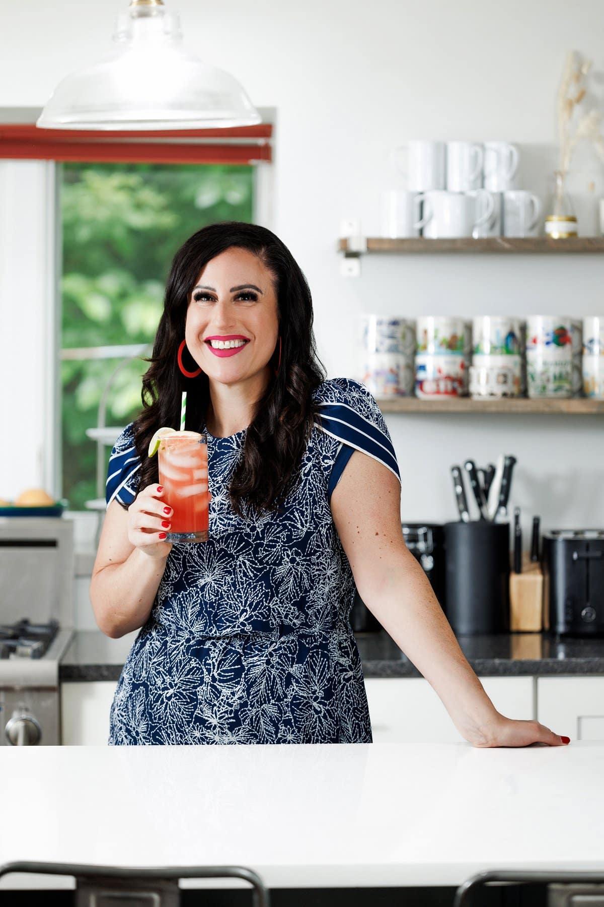 Liz drinking a greyhound cocktail.