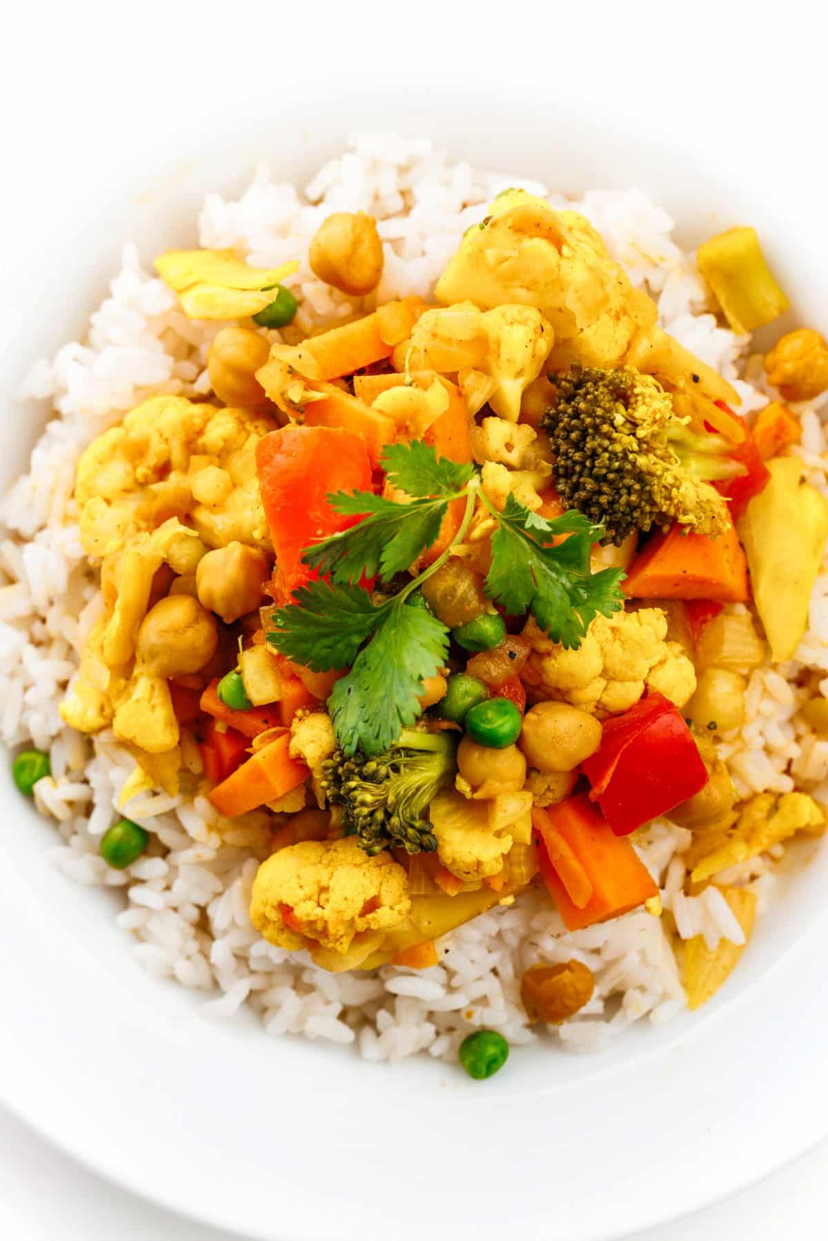 Top view of slow cooker vegetable curry with chickpeas.