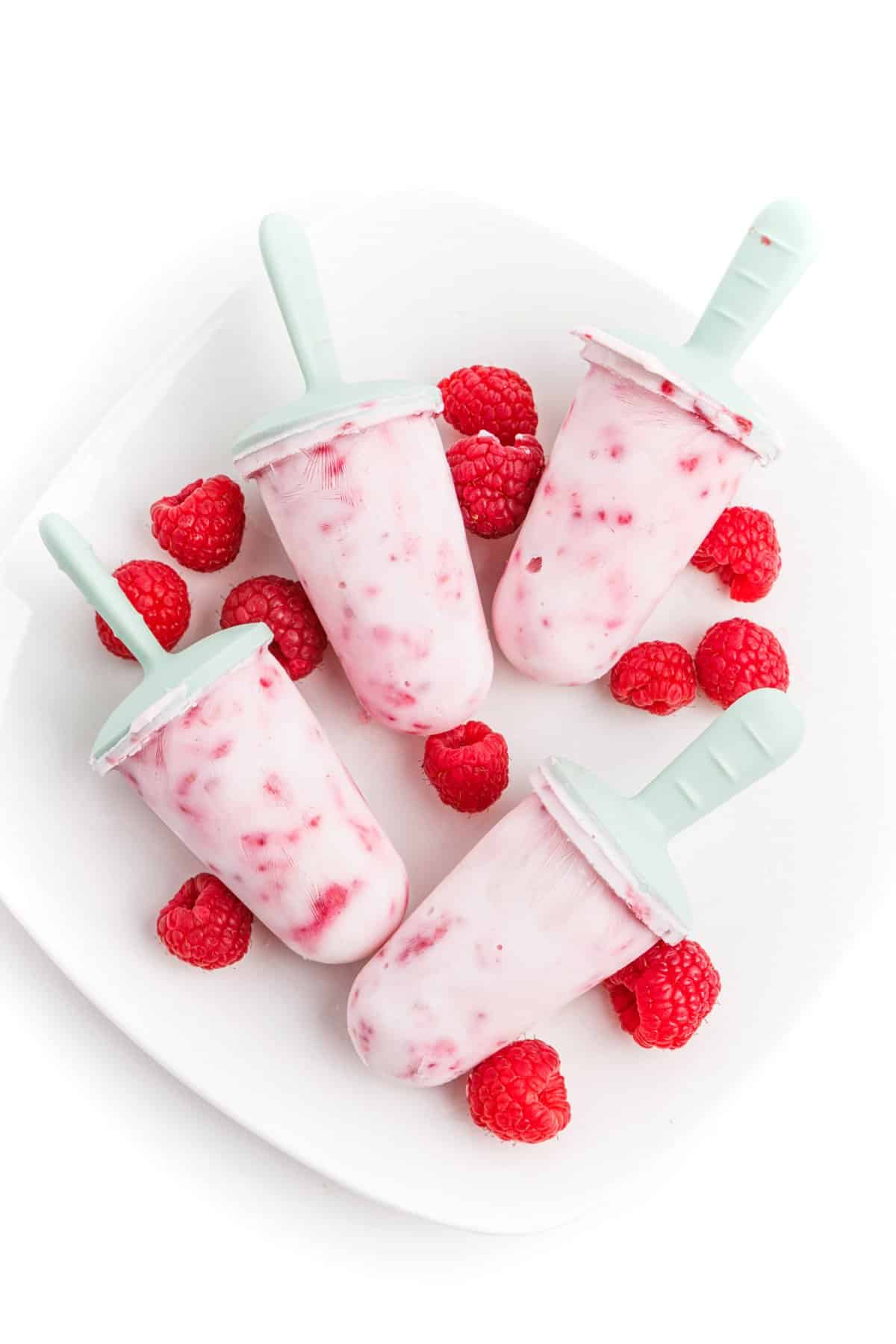 Raspberry Greek yogurt popsicles.
