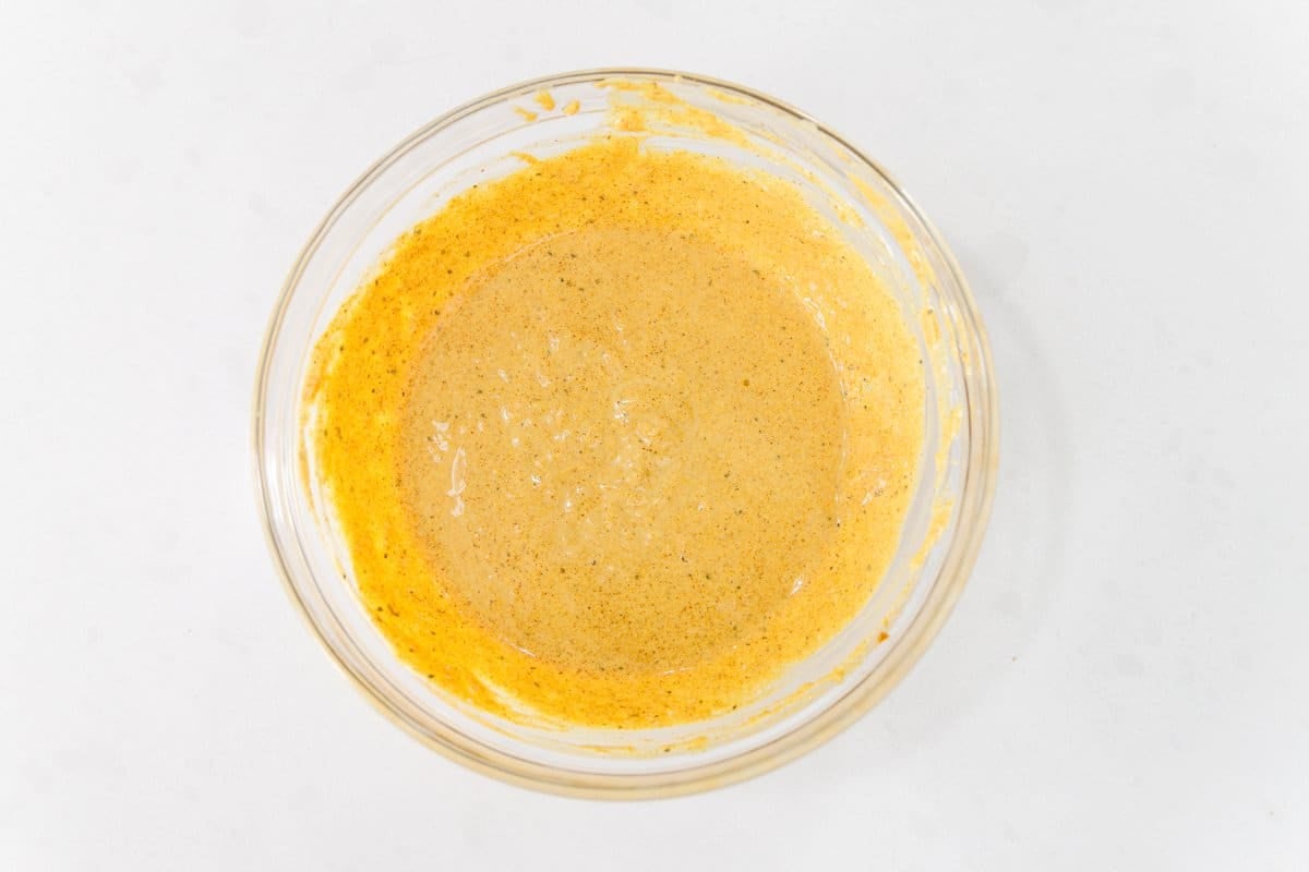 Indian spiced yogurt marinade in a bowl.