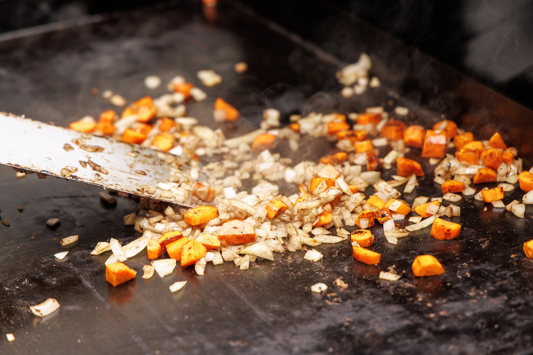 Cooking veggies for fried rice.